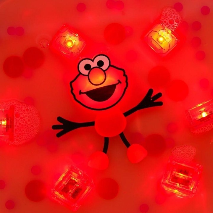 Set Personaje y 2 cubos con luz Glo Pals Barrio Sesamo - Elmo